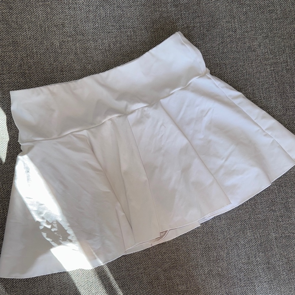 HALARA White Asymmetrical A-Line Mini Skirt for Resort Wear